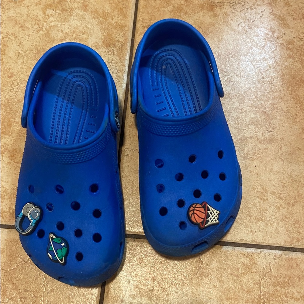 Blue Crocs with Fun Charms big kid size 3